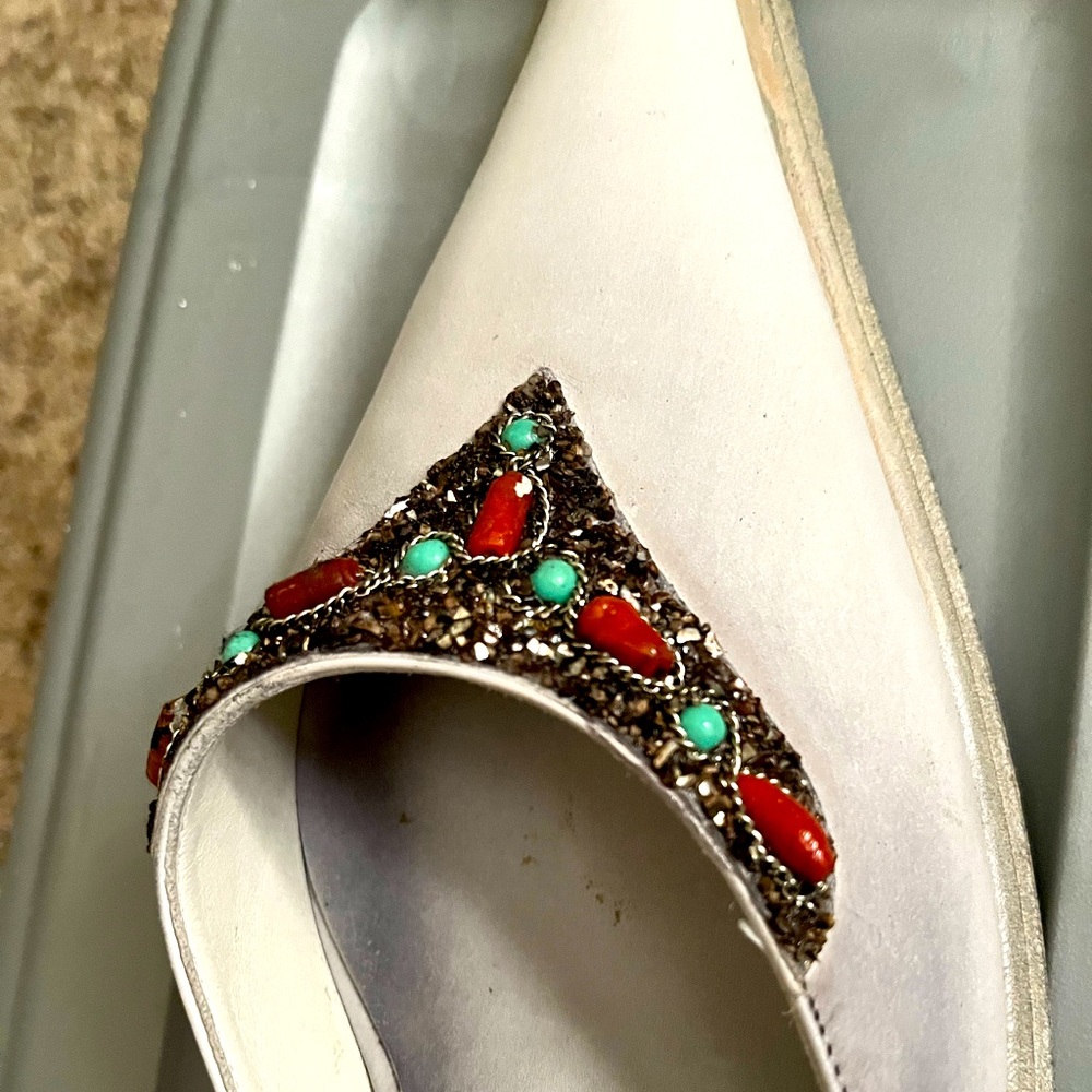 This is a white vintage Italian jeweled mule